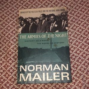 The army of the night by.Norman mailer